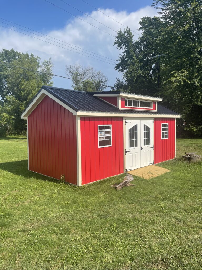 Red and white shed available at TLG Custom Sheds